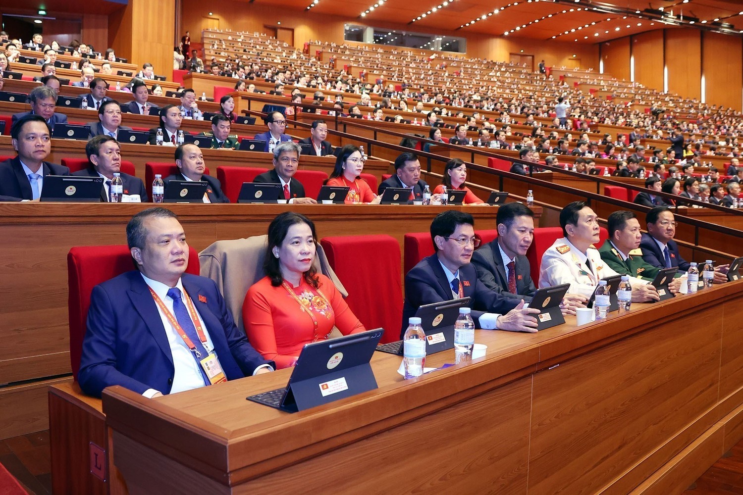 Các đại biểu dự phiên thảo luận tại hội trường về các văn kiện Đại hội, sáng 21/1. Ảnh: TTXVN